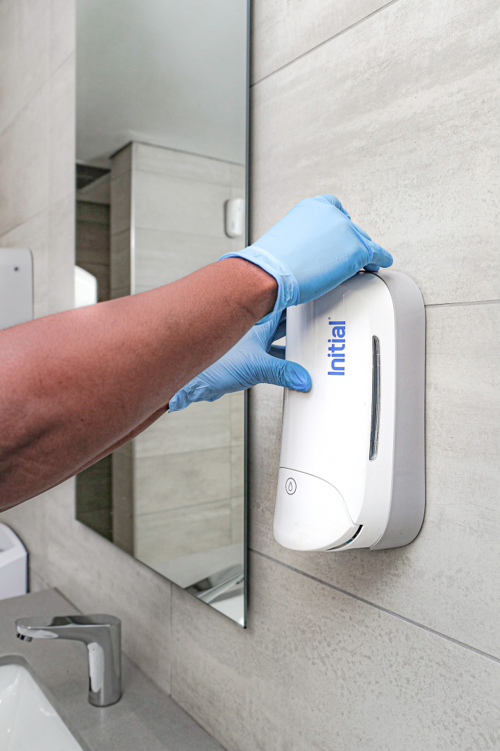 Manual dispenser of Signature 1l UltraProtect hand sanitizer - white
